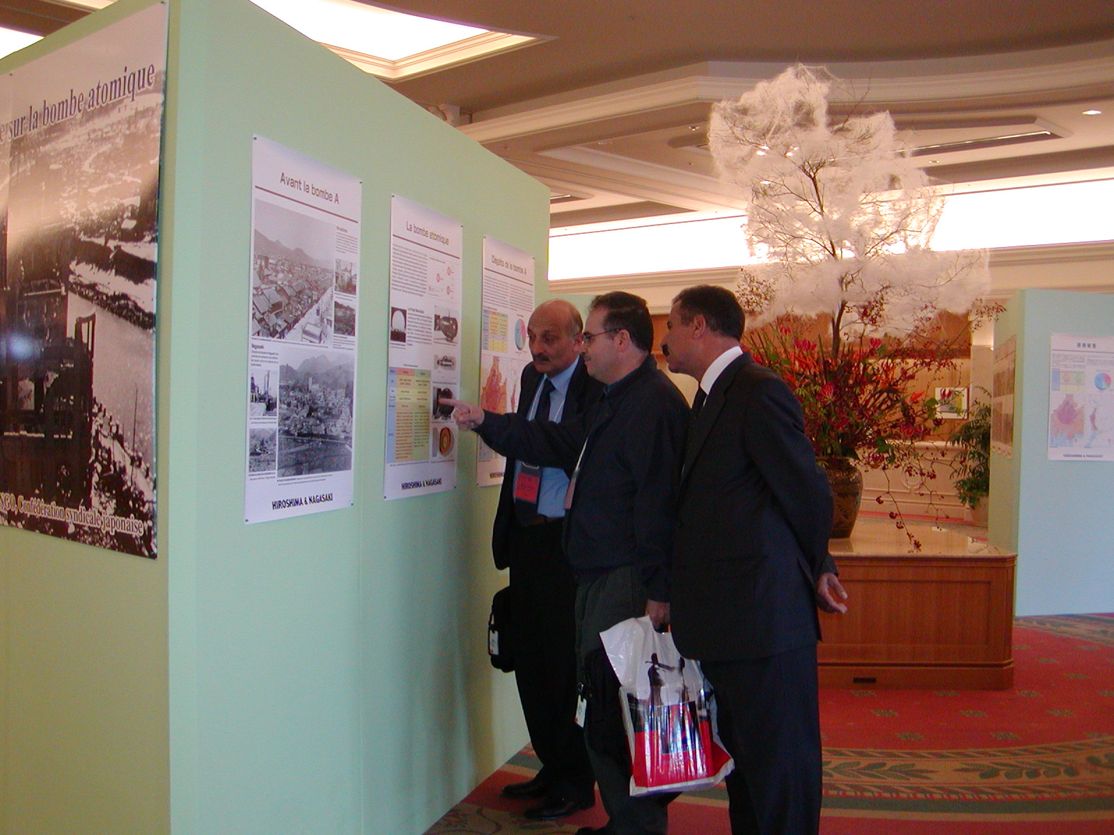 Photo: Delegates from overseas tour the Atomic Bomb Exhibit at the ICFTU World Congress. (December 5-10, Miyazaki)